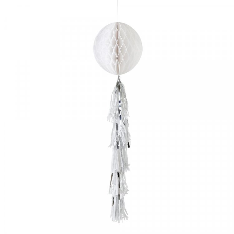White decorative hanging honeycomb ball with tassels.