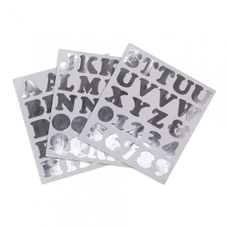 silver stickers in the shape of letters and numbers