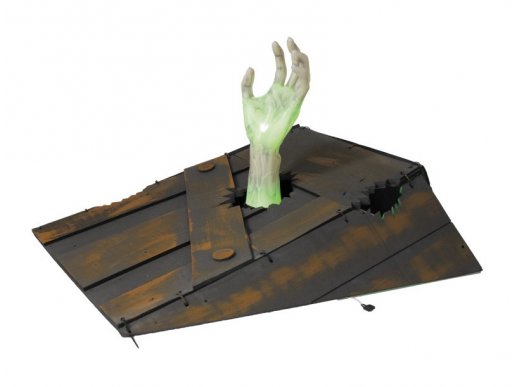Decorative coffin with the zombie hand standing out
