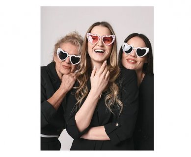 Heart shaped white color glasses with pearls and pink lences for a bachelorette party theme