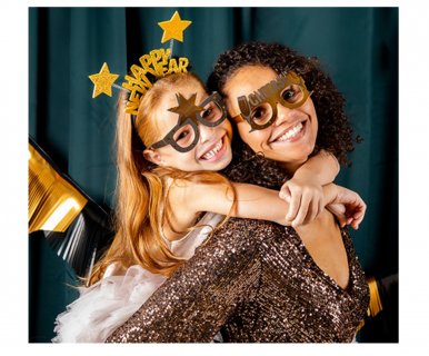 Paper party glasses for the New Year's Eve in black and gold metallic color