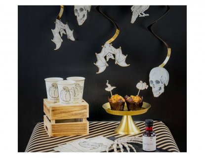 Gold hanging swirl decorations with bats, ravens and skulls for a Halloween party