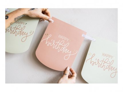 Decorative garland with rose and creme paper flags for a Birthday theme party