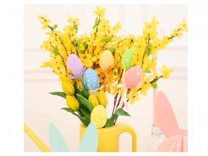 Colorful decorative eggs on stick for an Easter party theme decoration