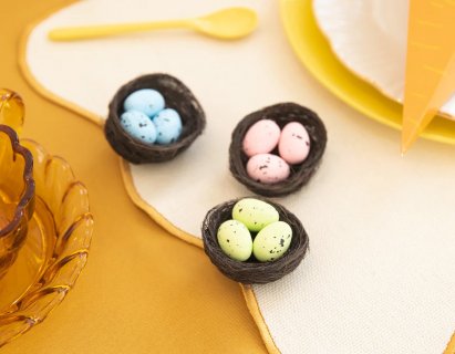 Decorative nests with colorful eggs for your Easter table decoration