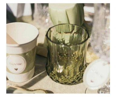 Reusable plastic glass in green color from the Elegance party collection