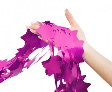 Decorative foil curtain in fuchsia color with stars