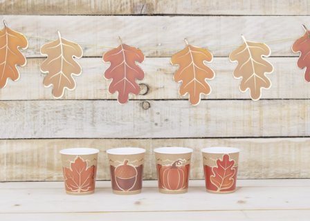Decorative cup wrappers with the autumn leaves, the pumpkin and the acorn.