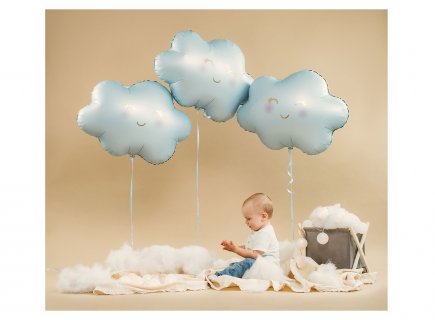 Foil balloon in the shape of a cloud in pastel blue color for party decoration