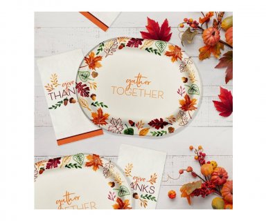 Gather together large oval shaped paper plates for a Thanksgiving party theme