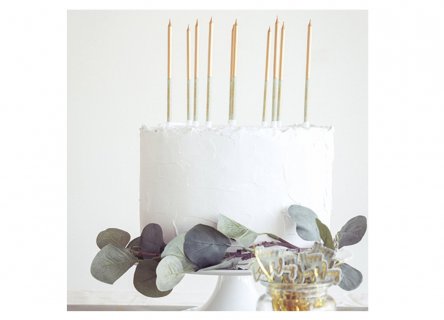 Tall birthday cake candles in grey and gold color with Happy Birthday print