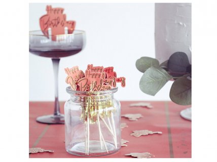 Decorative picks from the Golden Dusk collection for a birthday party