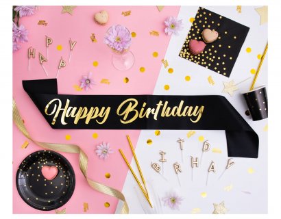 Black sash with gold Happy Birthday letters for a birthday party