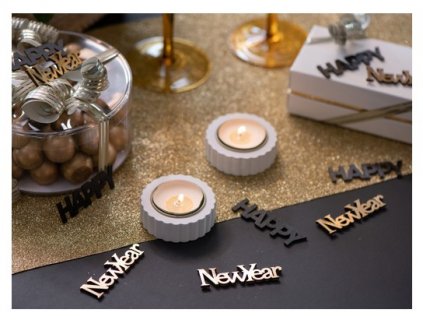 Small wooden decoration for the New Year's Eve in black and gold color
