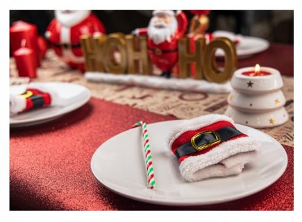 Furry napkin rings with Santa's belt for Christmas table decoration.