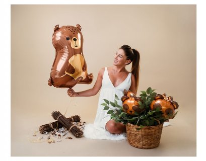 Foil balloon in the shape of a brown bear for party decoration