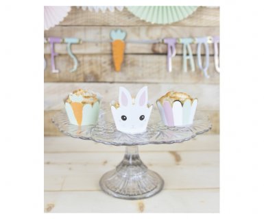 Decorative paper cupcake wrappers with bunny and carrot theme for Easter party