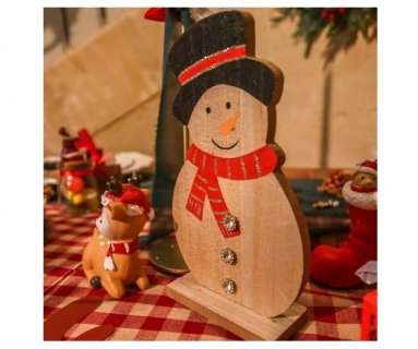 Wooden snowman for Christmas table decoration