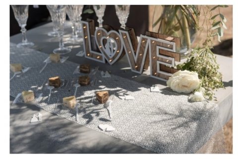 Fabric runner in white color with lace for table decoration