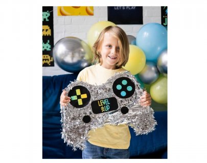 Pinata in the shape of a gaming controller in silver color