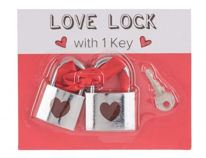 The locks of love in silver color with red hearts design for the Valentine's day