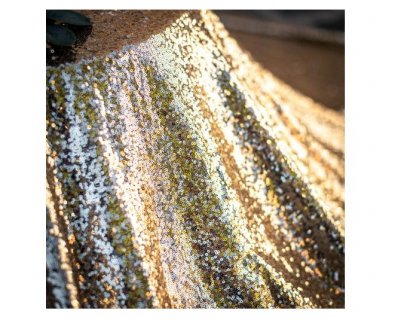A sublime square shaped tablecloth with gold sequins