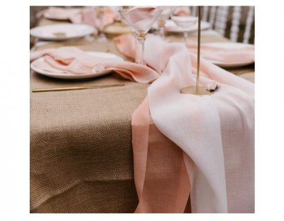 Decorative fabric table runner made of muslin in pink color