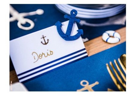White place cards with 3 blue stripes and a gold foiled anchor print for navy theme party decoartion.