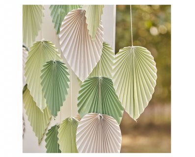Sage and cream decorative palm leaves for party decoration