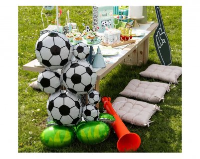 Self standing foil balloon in the shape of a tower with footballs