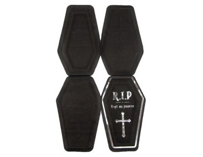 Black napkins in the shape of a coffin with silver foiled details for a birthday party