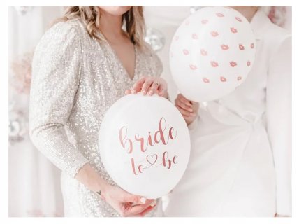 Pink, rose gold and white Bride to Be latex balloons for a bachelorette party
