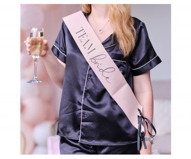 Pink sashes with black Team Bride print for bachelorette party