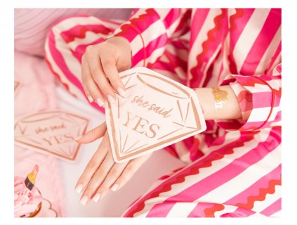 Diamond shaped napkins with She Said Yes print for a bachelorette party theme