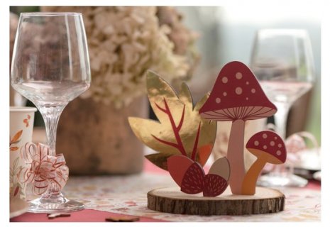 Wooden centerpiece with leaves, mushrooms and acorns