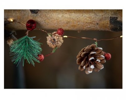 Decorative Christmas garland for home and party deco with artificial pine cones, mistletoes and lights