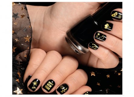 Gold nail stickers with various festive designs great for the New Year's Eve