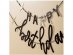 Decorative garland with black Happy Birthday letters and little stars