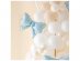 Bow shaped foil balloons in light blue color for party decoration