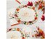 Gather together large oval shaped paper plates for a Thanksgiving party theme