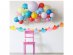 Decorative garland with paper fans in pastel colors