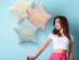 Star shaped foil balloon in pale blue matt color with gold Happy Birthday print