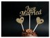 Gold decorative picks with hearts and Just Married letters for the wedding party