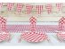 Fabric cotton runner in red gingham design for the table decoration