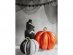 Self standing foil balloon in a 3D shape of a pumpkin for a Halloween theme party