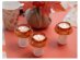 Small glass candle holder in the shape of a mushroom