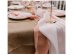 Decorative fabric table runner made of muslin in pink color