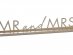 Gold metal table sign for the wedding with Mr and Mrs letters