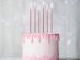 Tall birthday cake candles in rose gold color