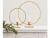 Set of round shaped candle holders in gold color for party and home decoration